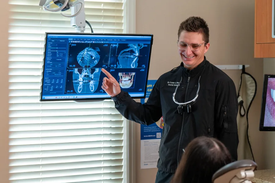 Caleb Martin reviewing three-dimensional dental imaging